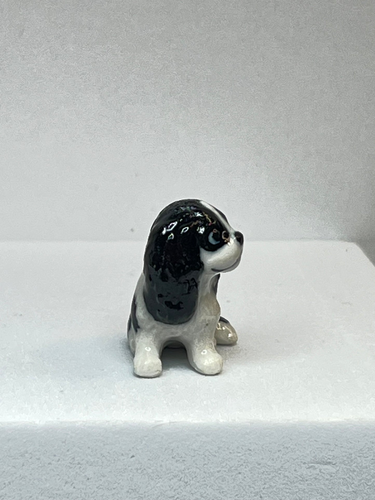 Miniature Porcelain Black and White Springer Spaniel Sitting Figurine