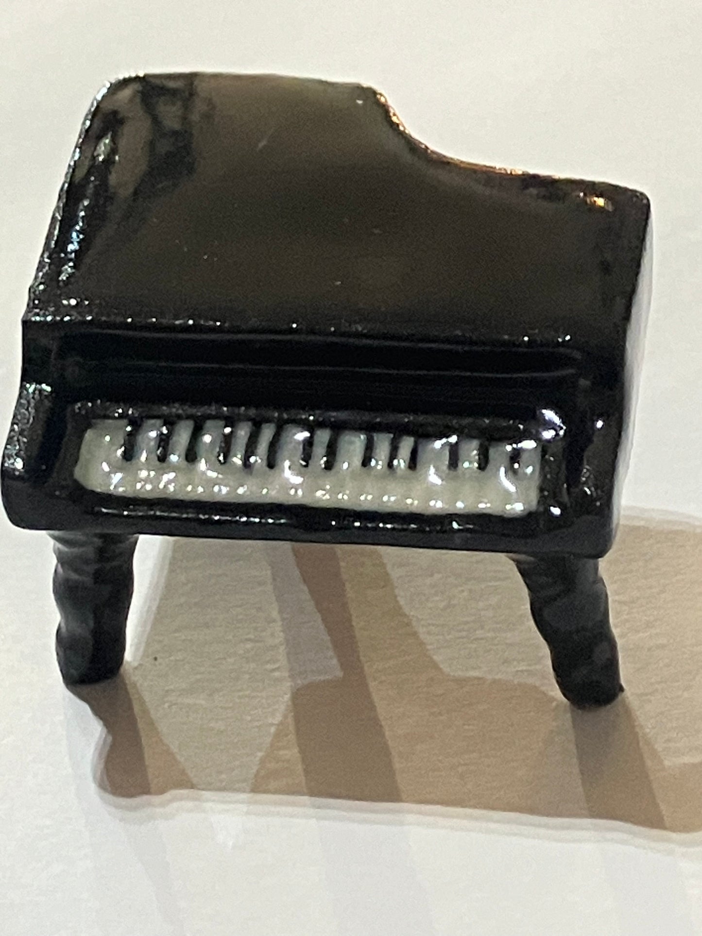 Miniature Porcelain Penguin Playing Piano