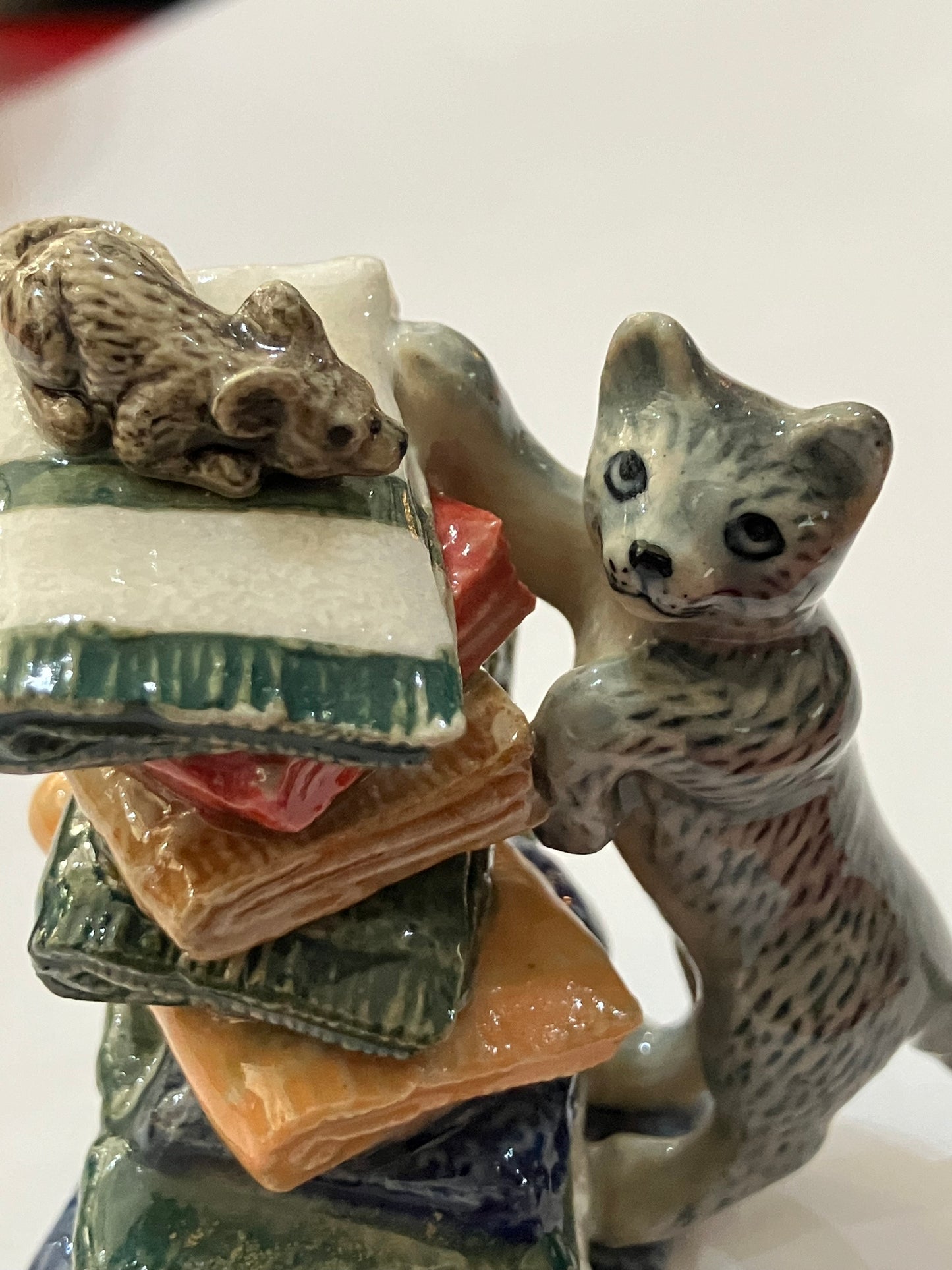 Miniature Porcelain Grey Cat Chasing Mouse On Towels