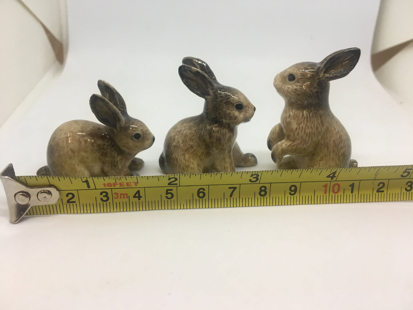 Miniature Porcelain Rabbit Figurines Brown And Black.