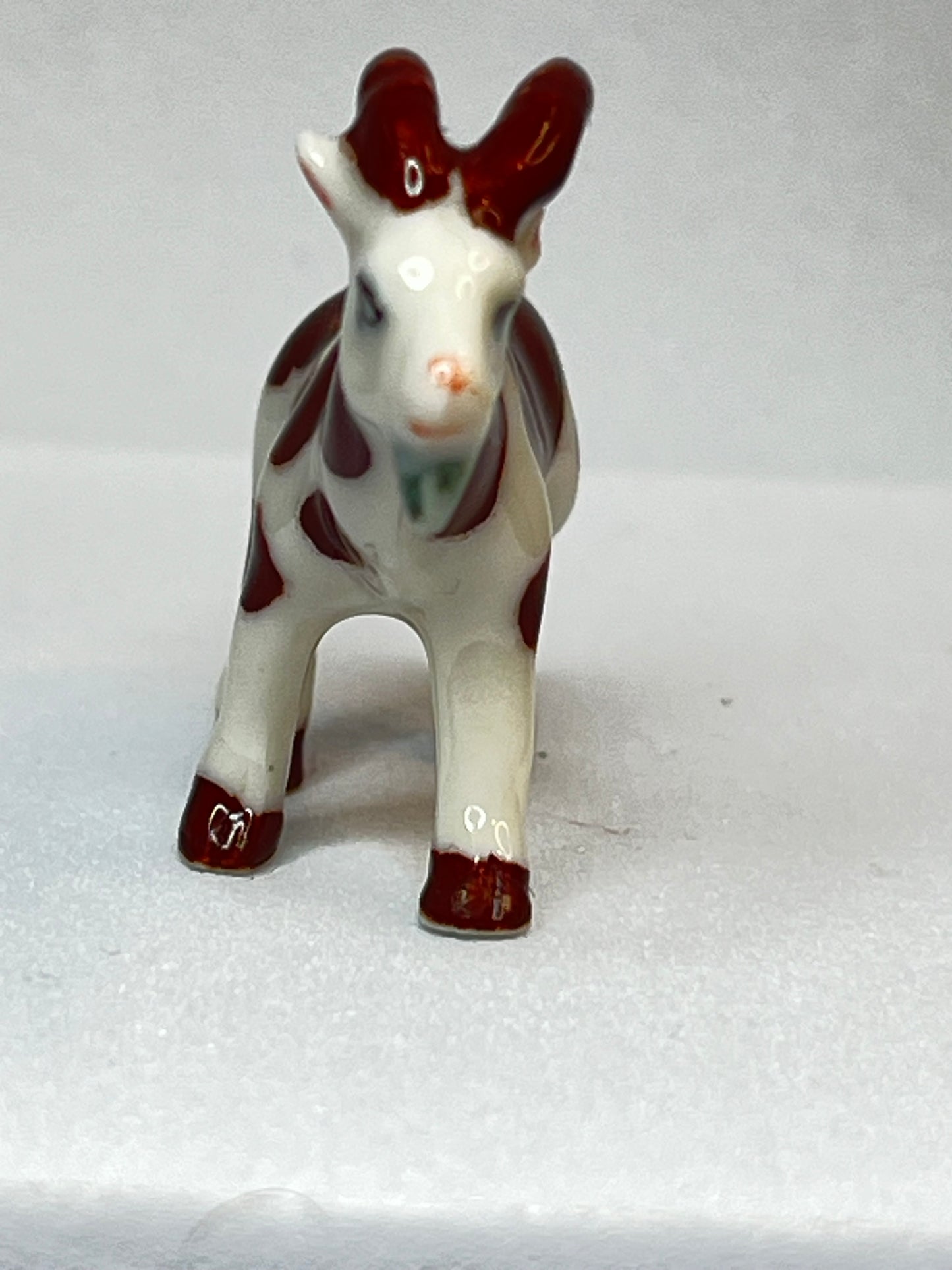 Miniature Porcelain Brown and White Goat Figurine