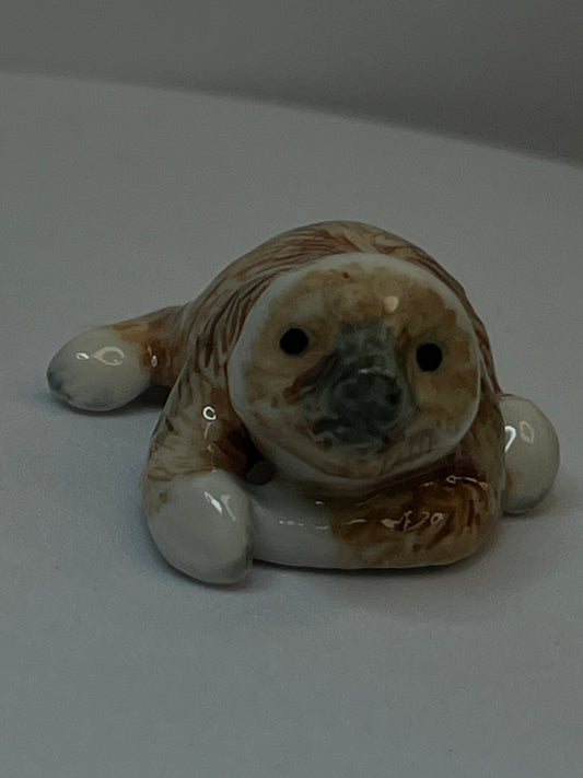 Miniature Porcelain Sloth Figurine Lying Down