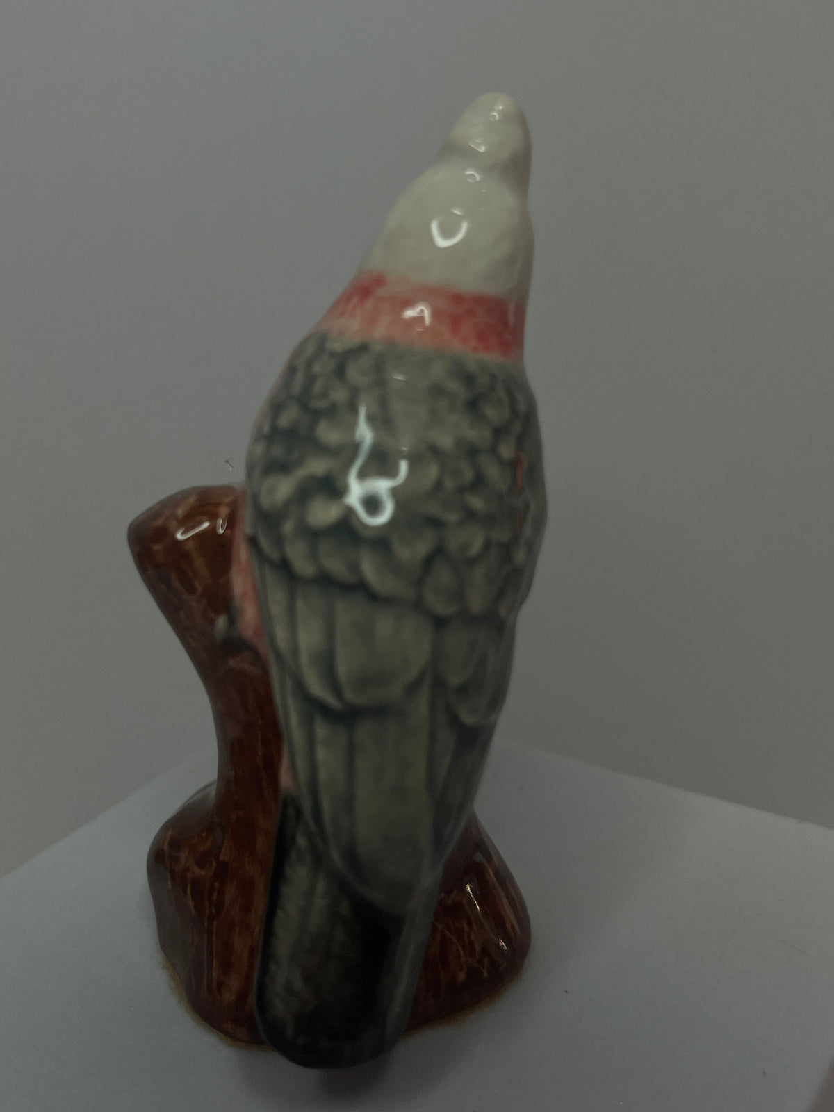 Miniature Porcelain Pink Galah Figurine on Log
