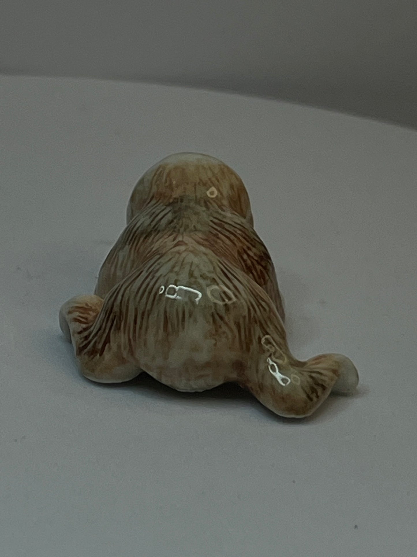 Miniature Porcelain Sloth Figurine Lying Down