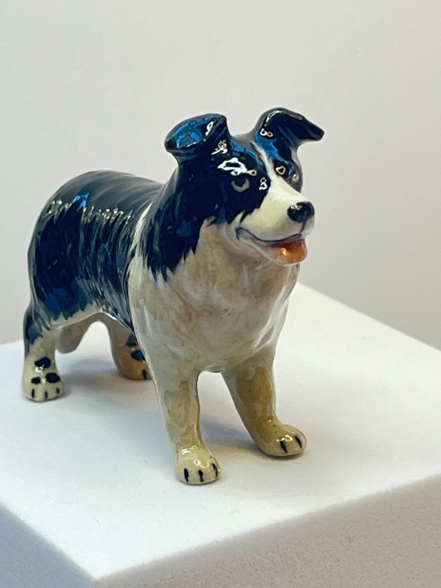 Miniature Porcelain Black and White Border Collie Figurine