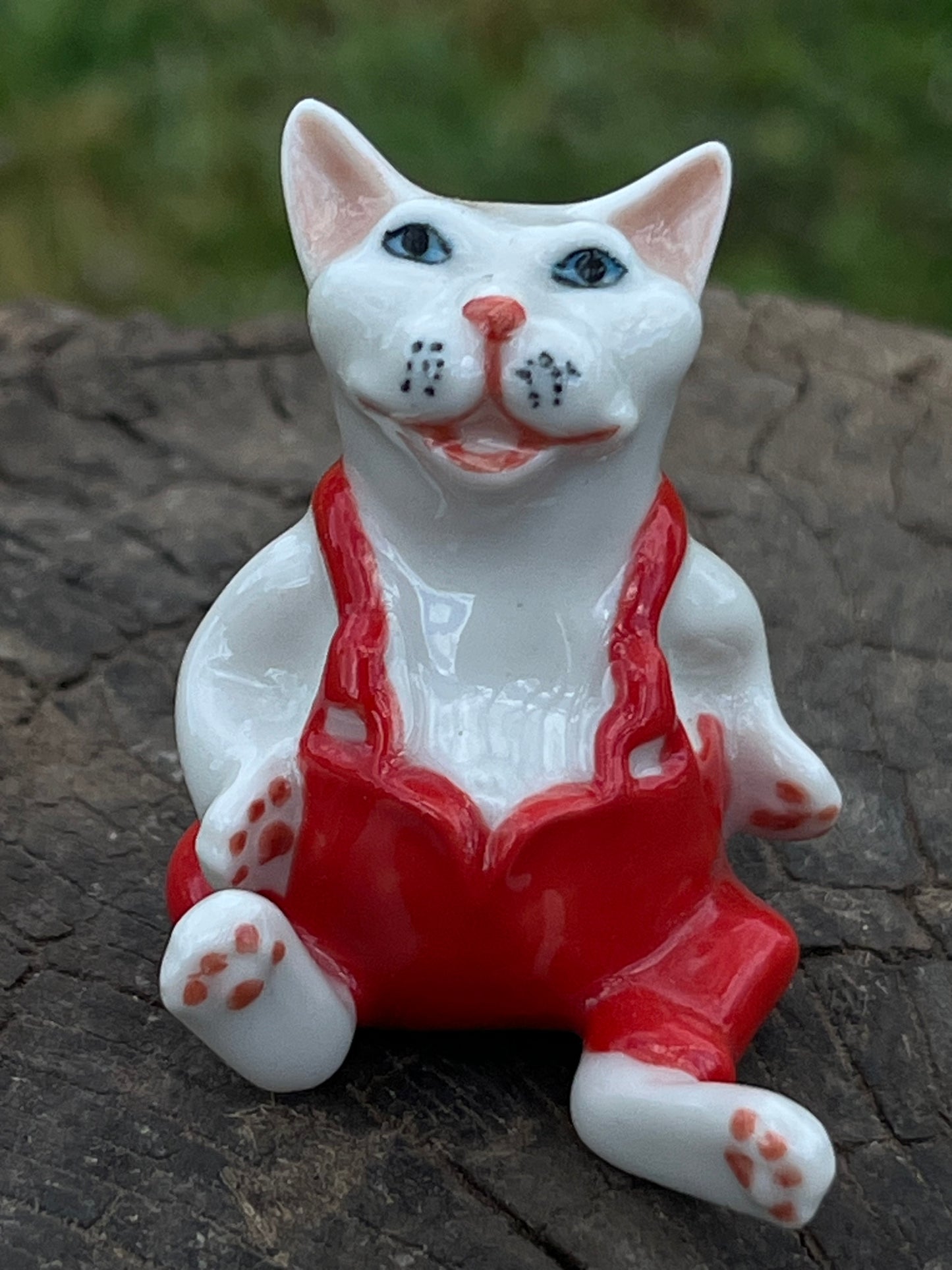 Miniature Porcelain Cat Sitting Wearing Red Pants Figurine
