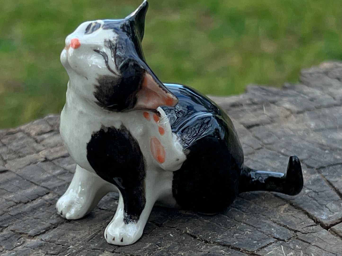 Miniature Porcelain Black and White Cat Scratching Its Ear Figurine