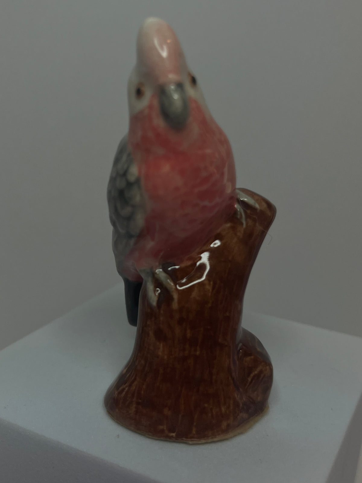 Miniature Porcelain Pink Galah Figurine on Log
