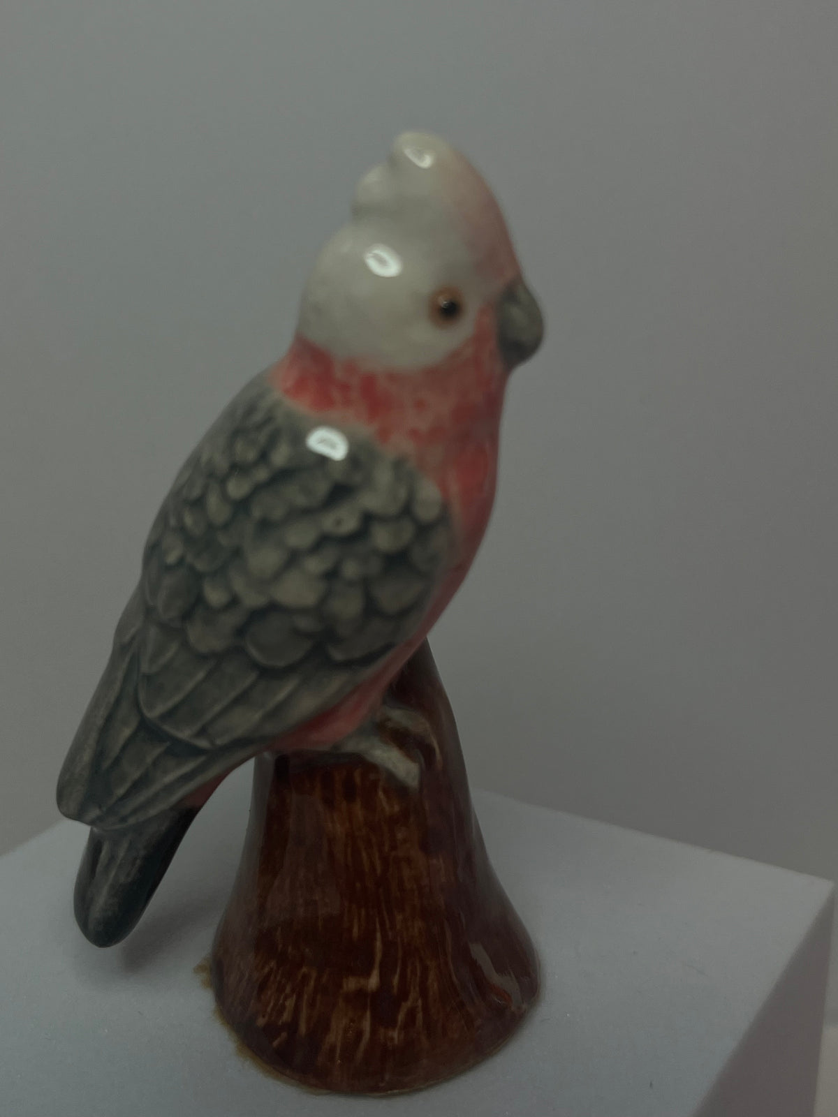 Miniature Porcelain Pink Galah Figurine on Log