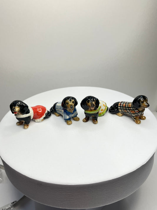 Miniature Porcelain Black Dachshund with Clothes Set of 4 Figurines
