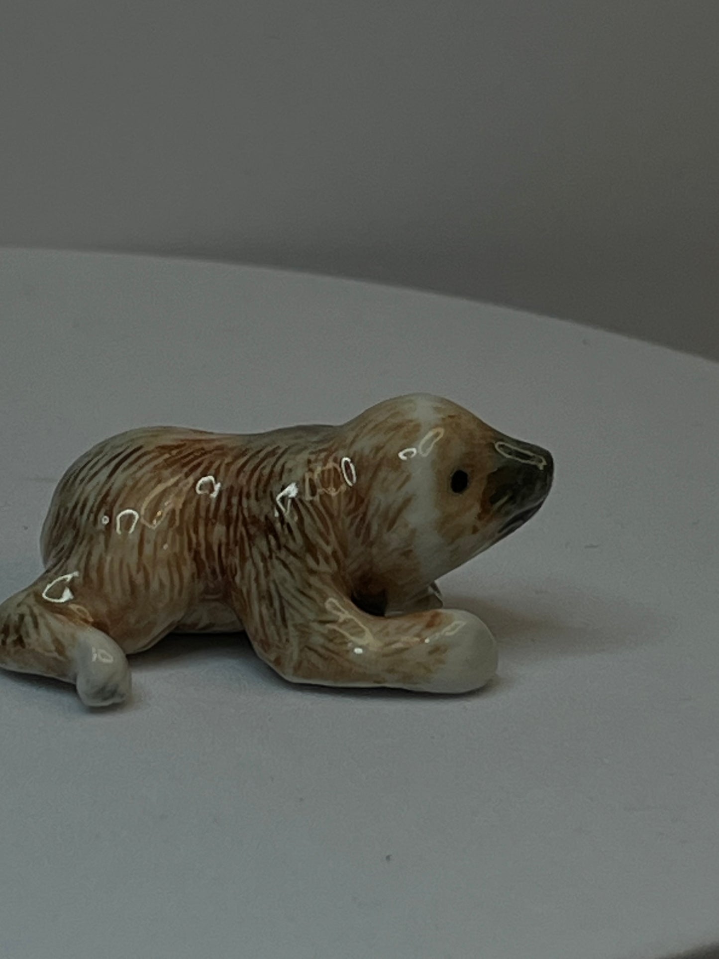 Miniature Porcelain Sloth Figurine Lying Down