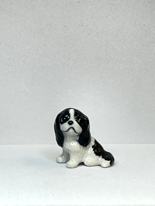 Miniature Porcelain Black and White Springer Spaniel Sitting Figurine