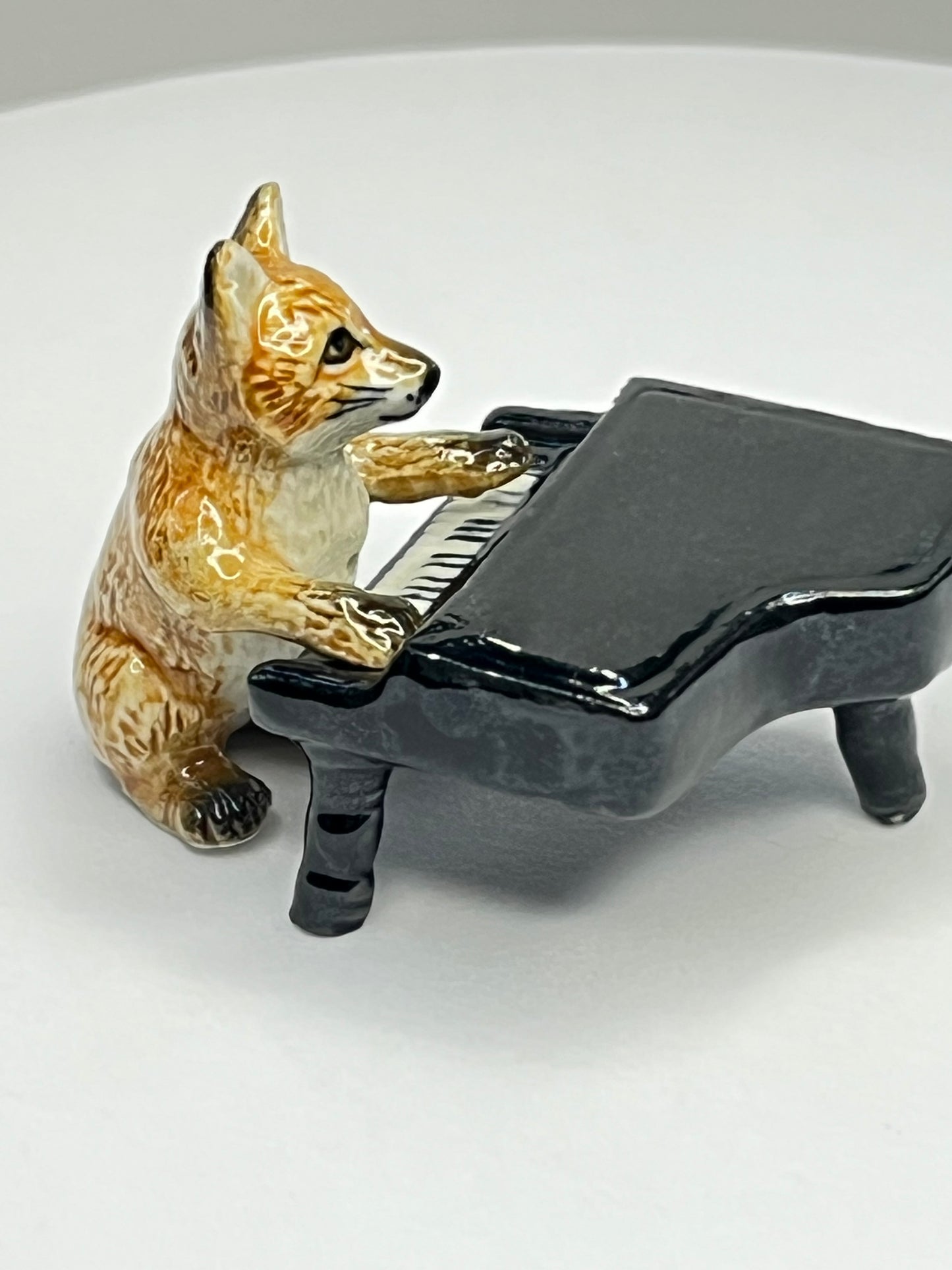Miniature Porcelain Fox Playing the Piano Figurine