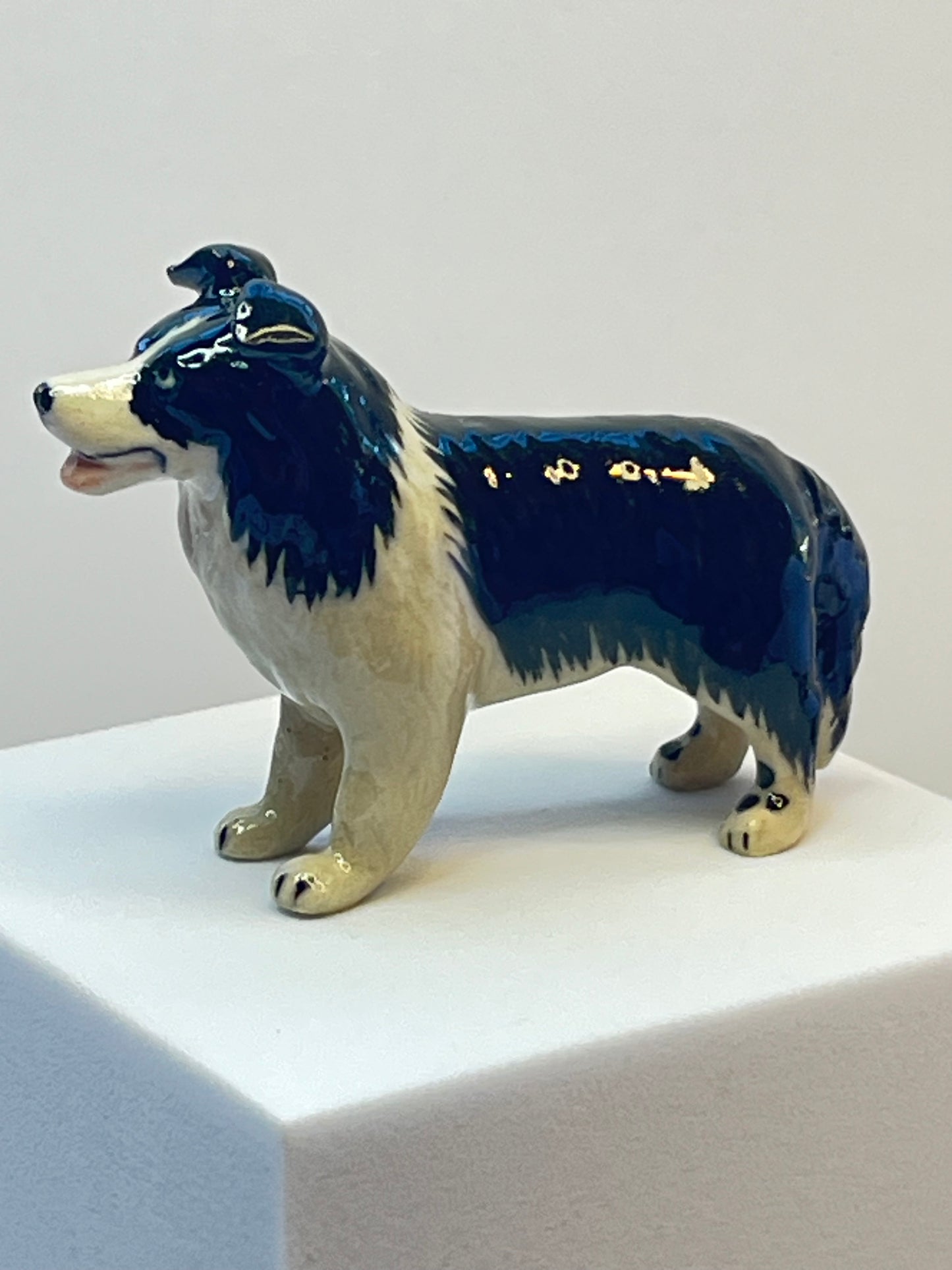 Miniature Porcelain Black and White Border Collie Figurine