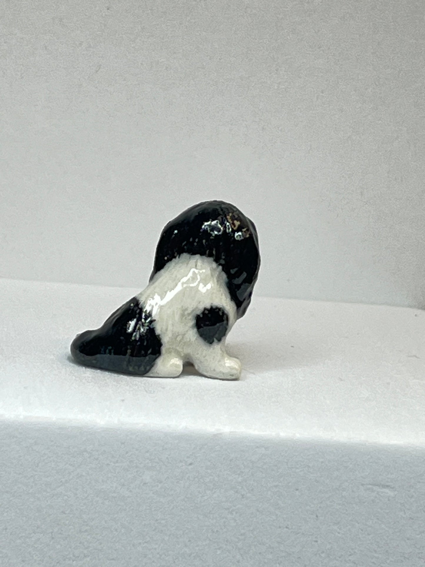 Miniature Porcelain Black and White Springer Spaniel Sitting Figurine