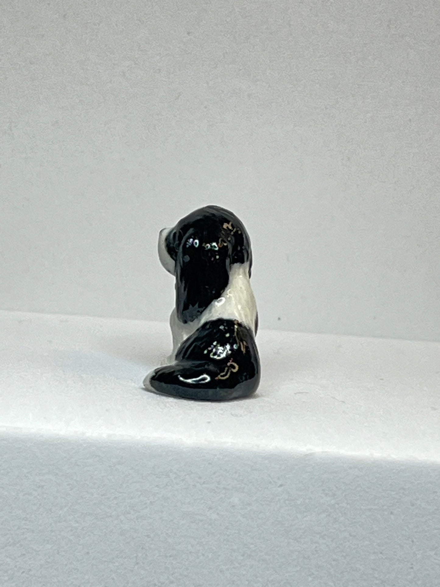 Miniature Porcelain Black and White Springer Spaniel Sitting Figurine