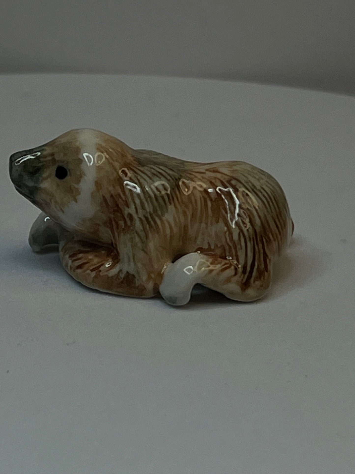 Miniature Porcelain Sloth Figurine Lying Down