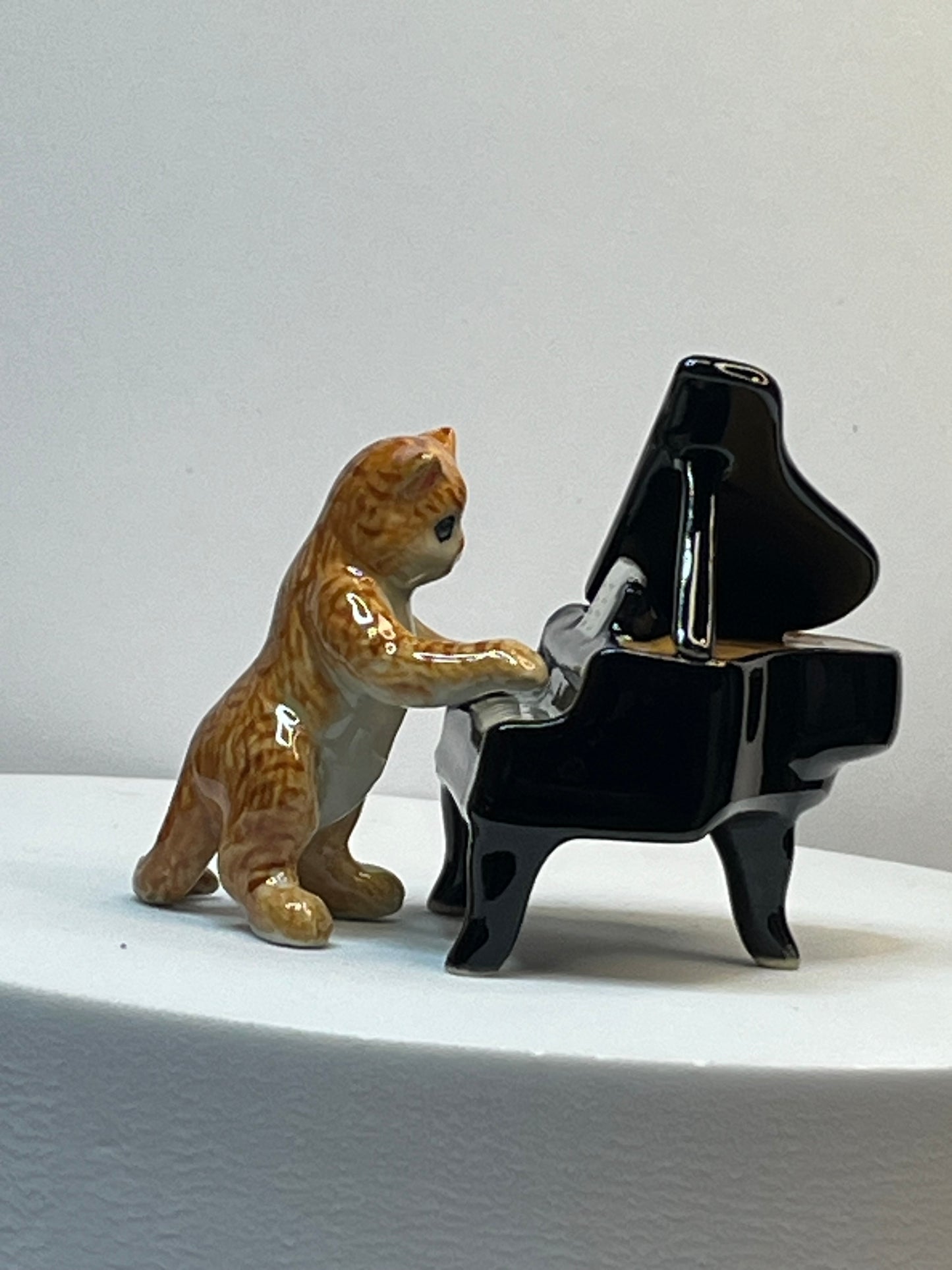 Miniature Porcelain Musical Ginger Cat Figurine Playing Piano
