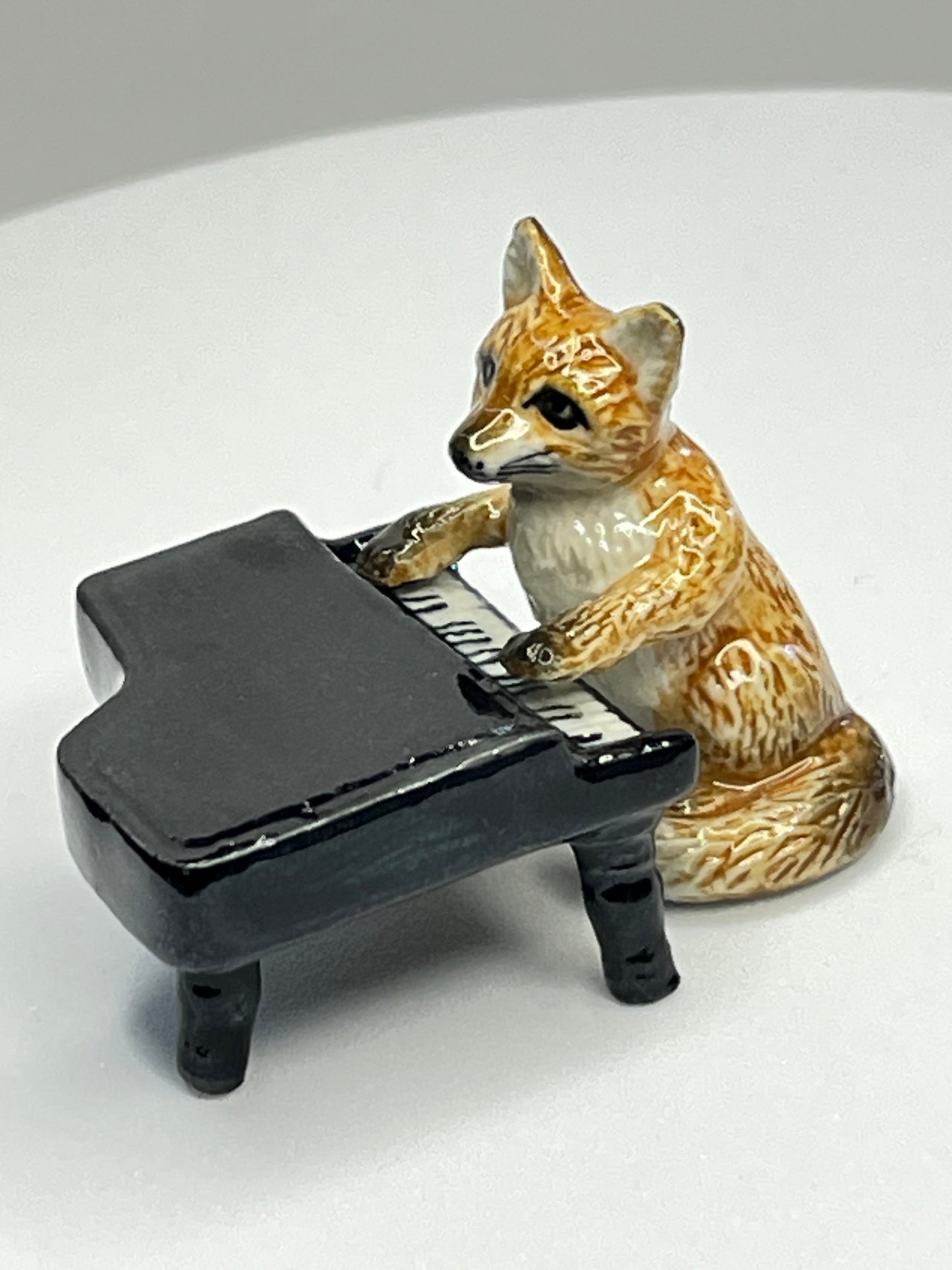 Miniature Porcelain Fox Playing the Piano Figurine