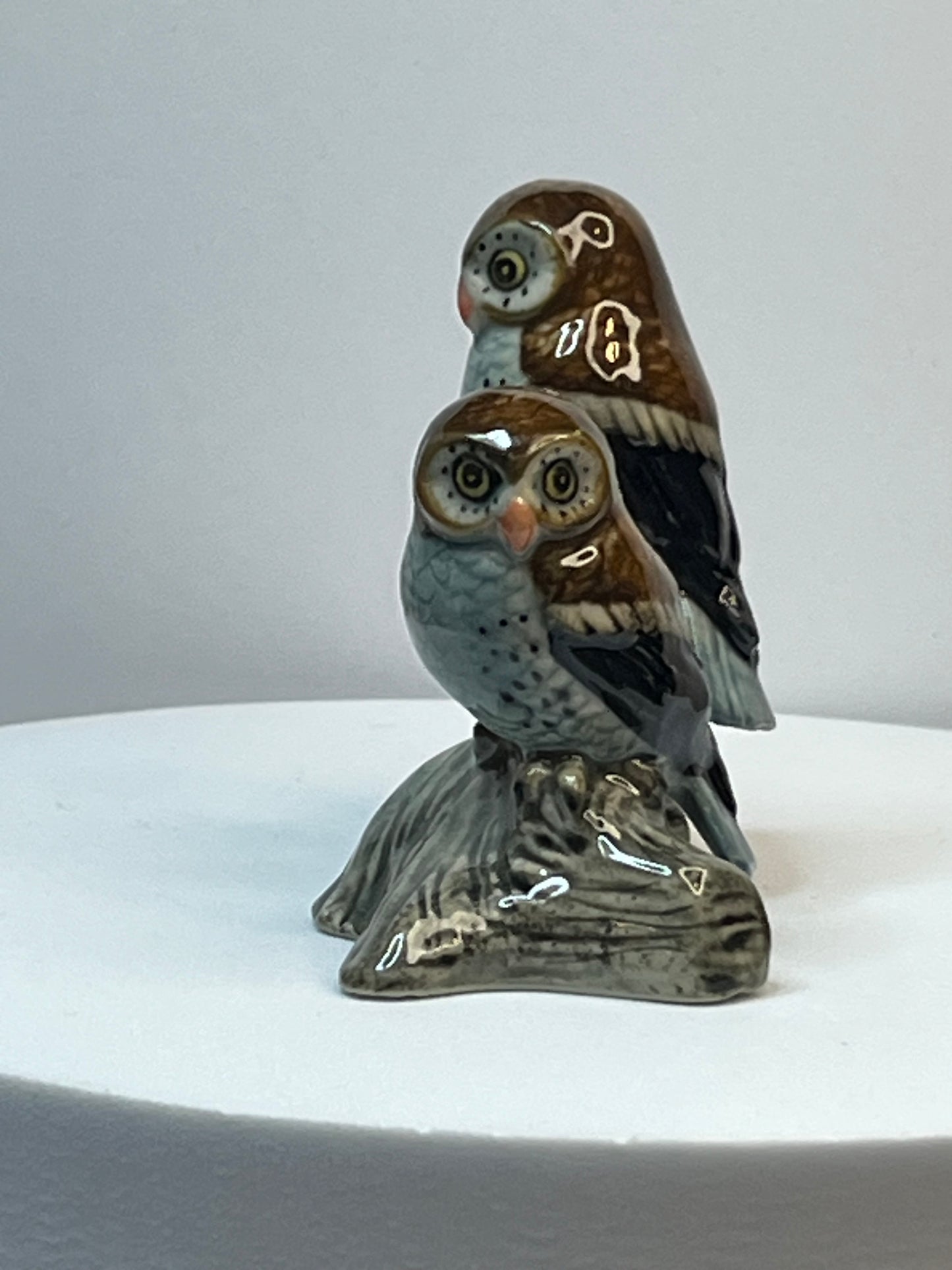 Miniature Porcelain Two Brown and Blue Owls on Log Figurine
