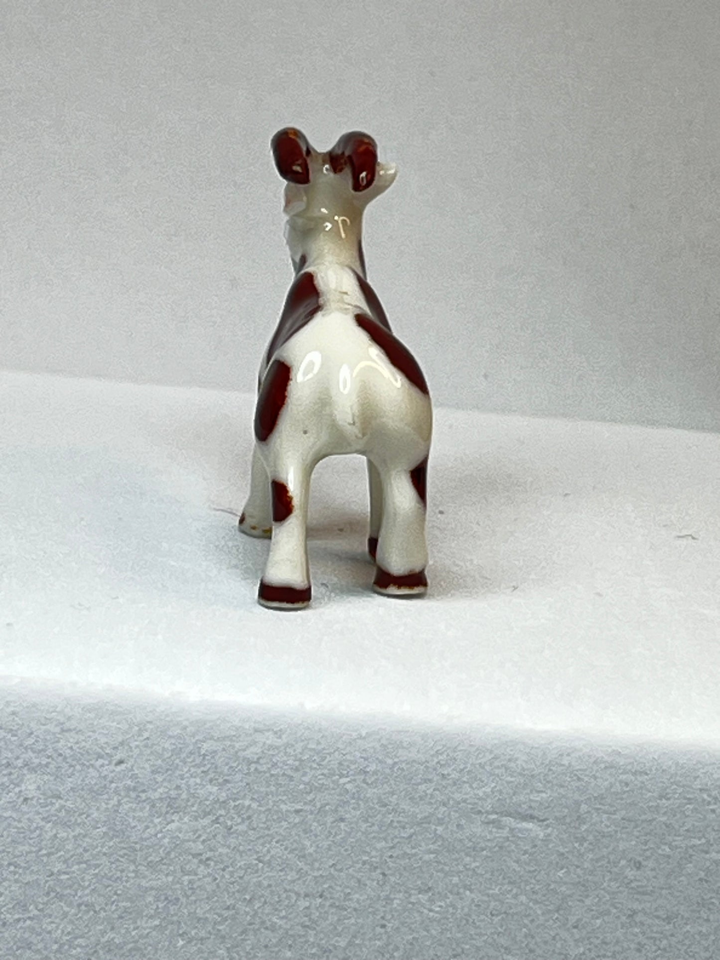 Miniature Porcelain Brown and White Goat Figurine