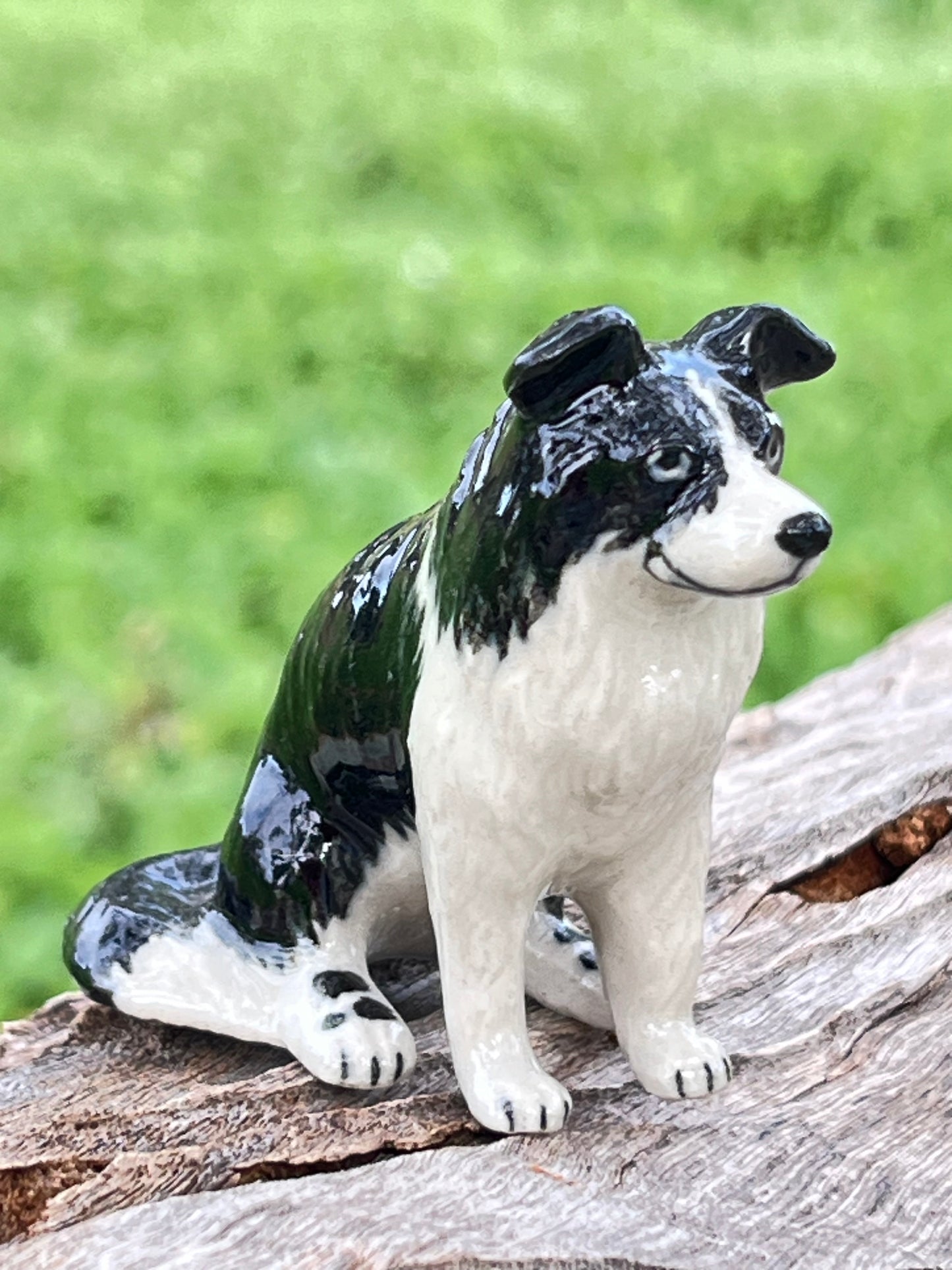Miniature Porcelain Sitting Black and White Border Collie Figurine