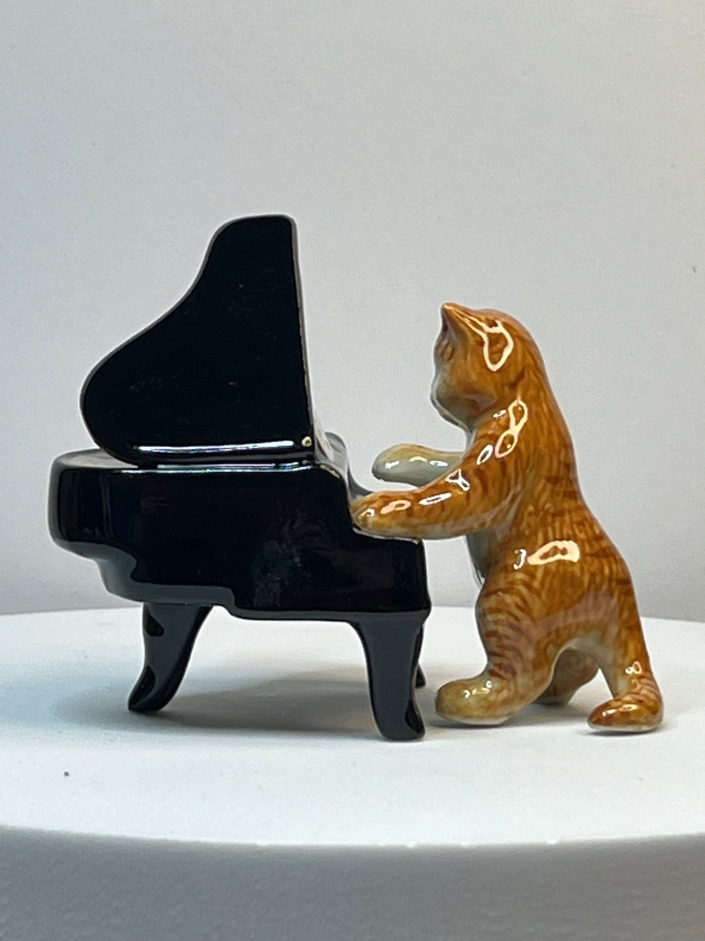 Miniature Porcelain Musical Ginger Cat Figurine Playing Piano