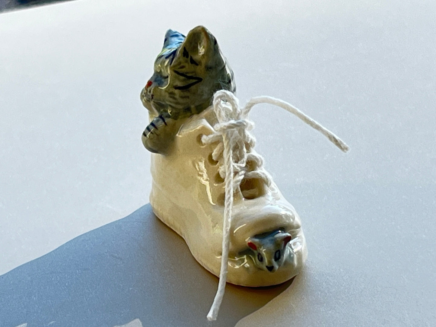 Miniature Porcelain Grey Cat Sleeping in Shoe With Mouse Figurine