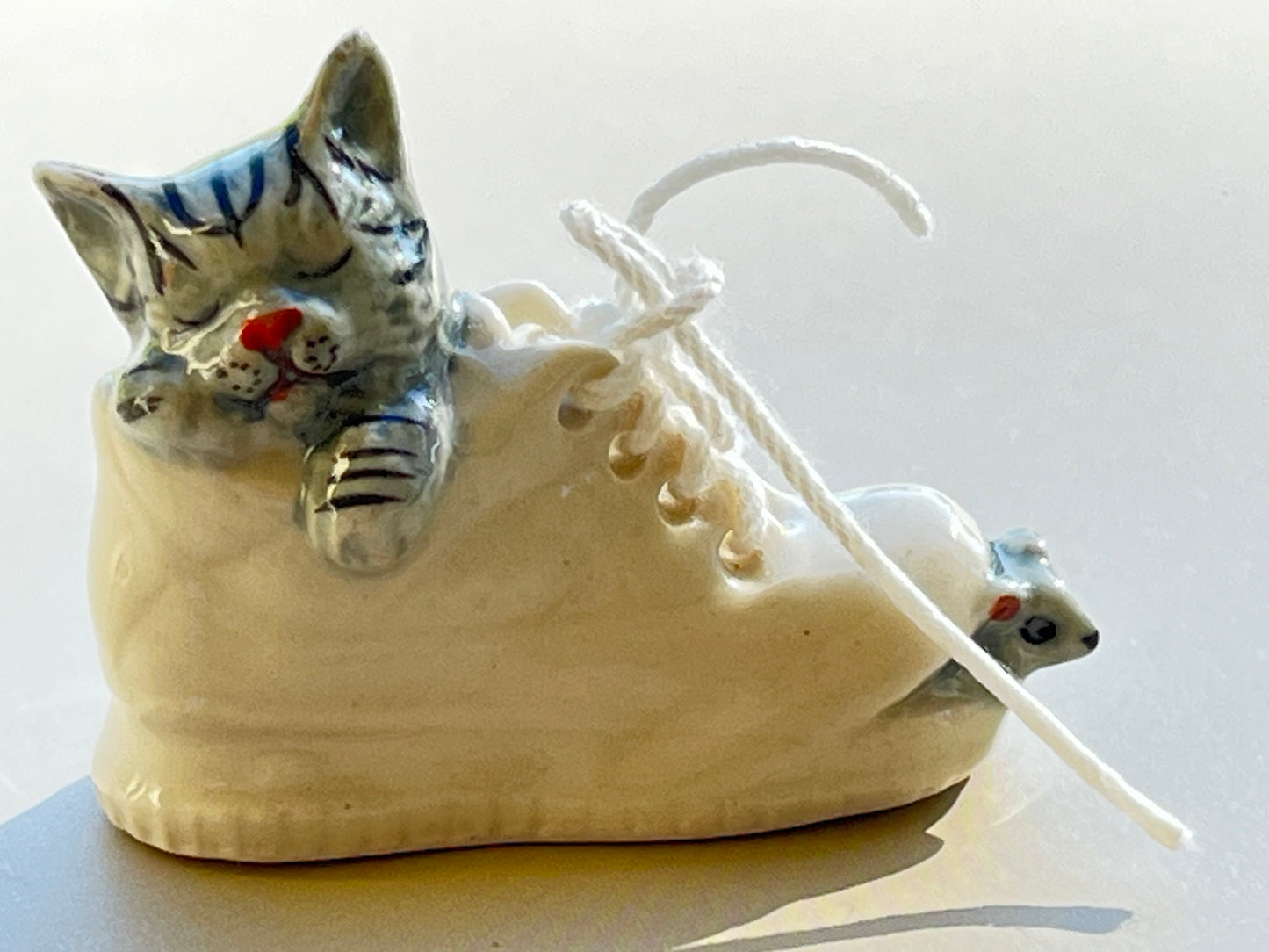 Miniature Porcelain Grey Cat Sleeping in Shoe With Mouse Figurine