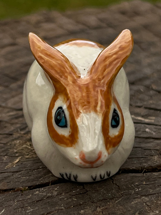 Miniature Porcelain Ginger and White Rabbit Sitting Ears Down Figurine