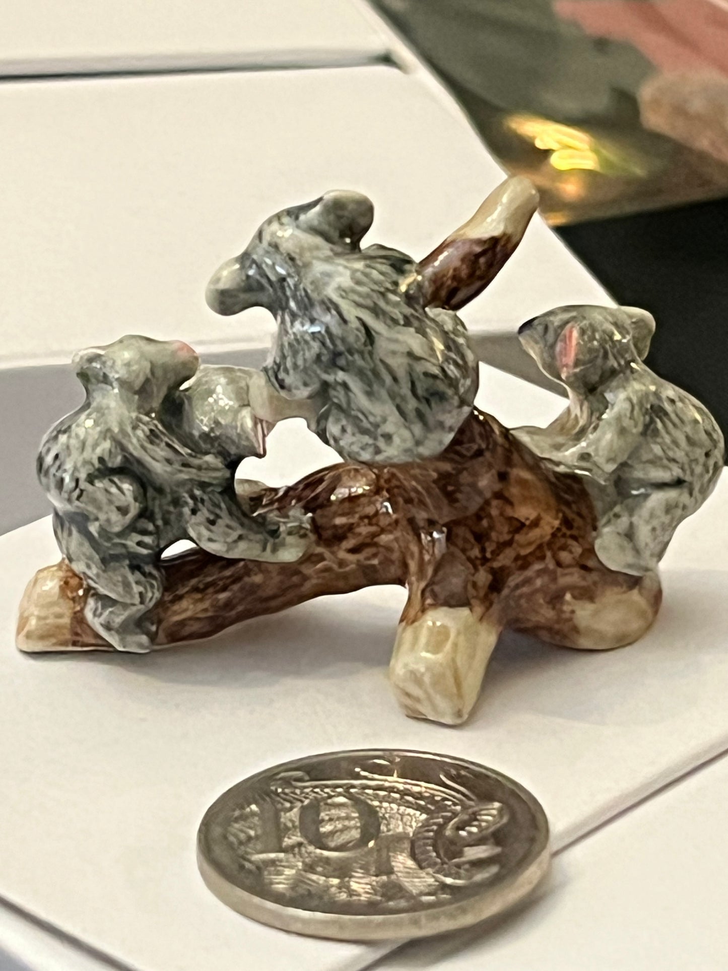 Miniature Porcelain Koalas on Tree Branch