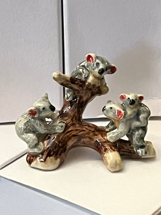 Miniature Porcelain Koalas on Tree Branch