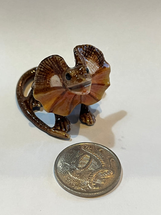 Miniature Porcelain Frill Neck Lizard Chlamydosaurus kingii