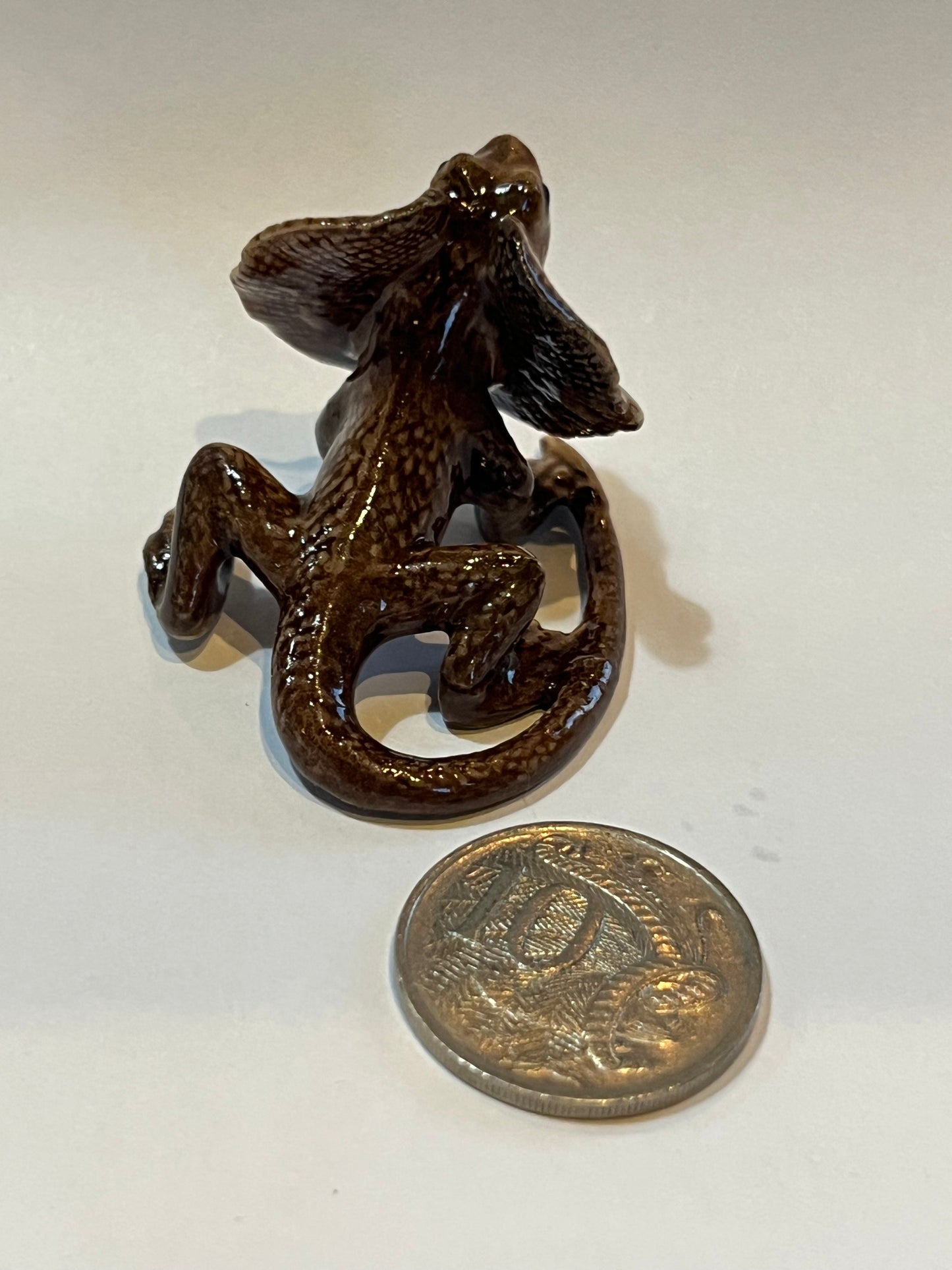Miniature Porcelain Frill Neck Lizard Chlamydosaurus kingii