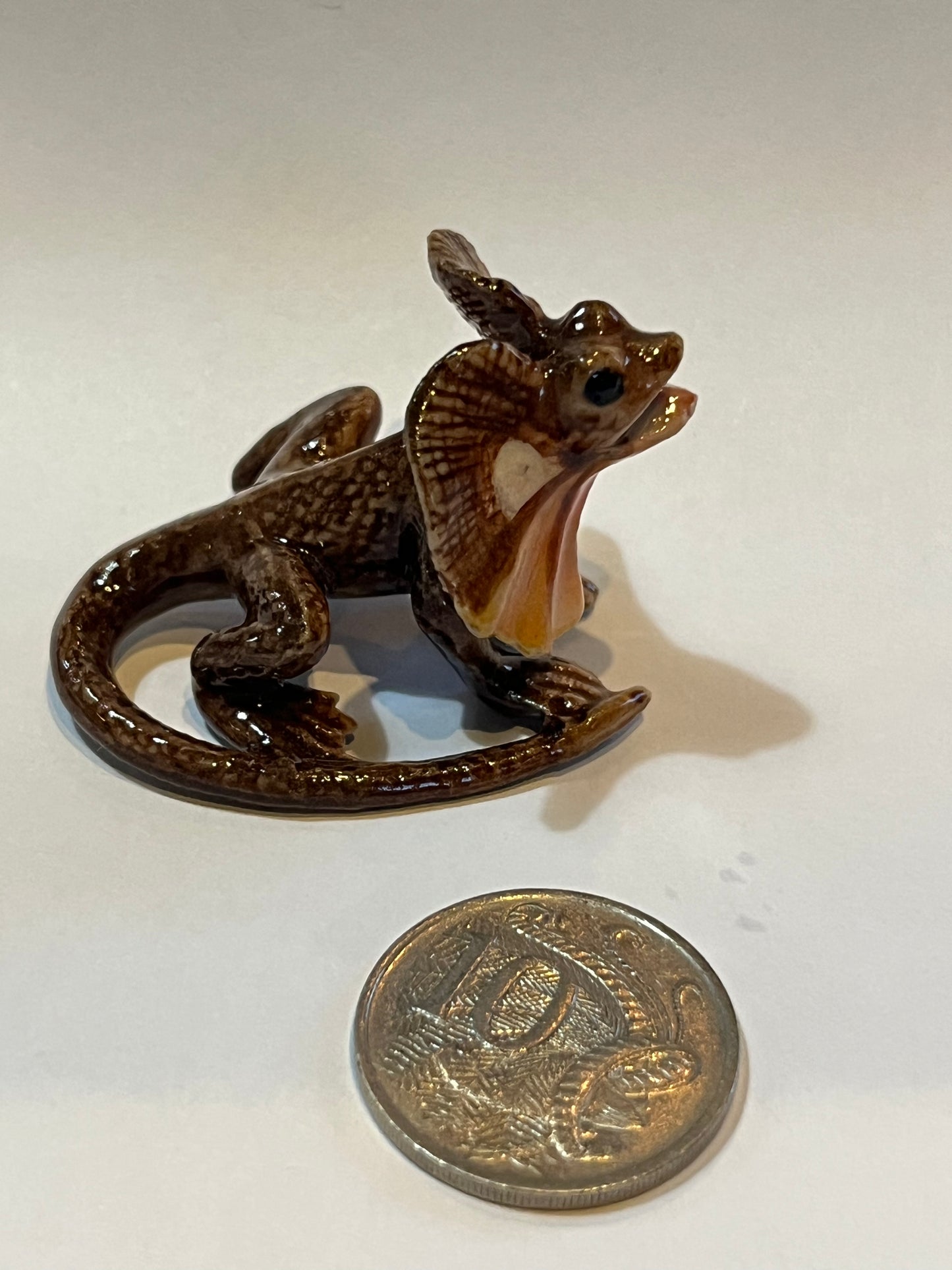 Miniature Porcelain Frill Neck Lizard Chlamydosaurus kingii
