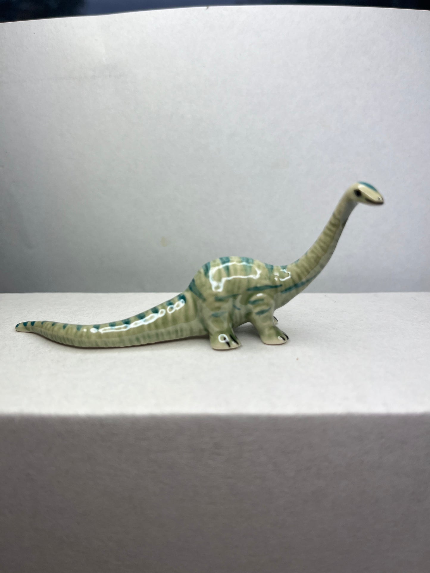 Miniature Porcelain Diplodocus Dinosaur Figurine