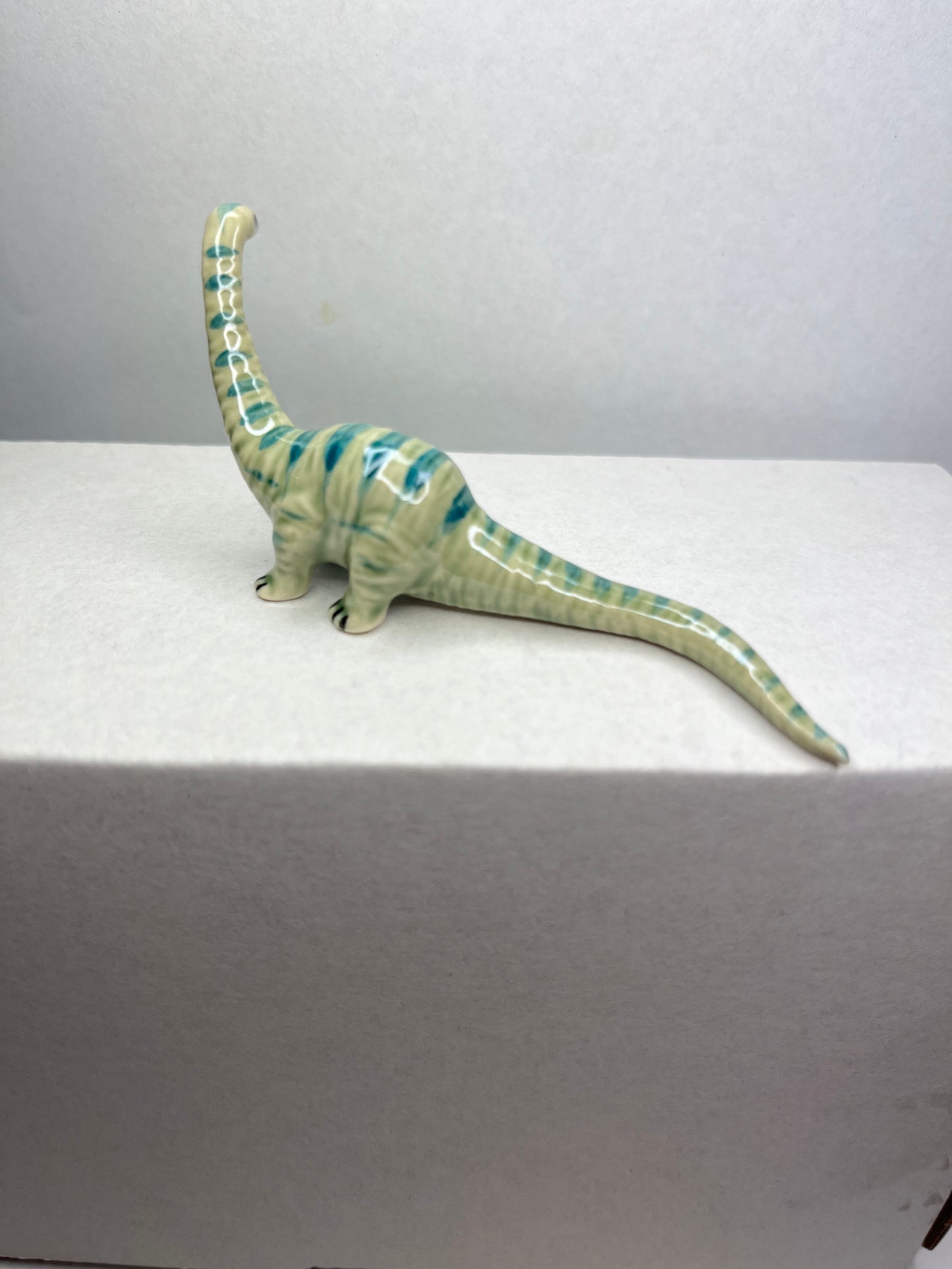 Miniature Porcelain Diplodocus Dinosaur Figurine
