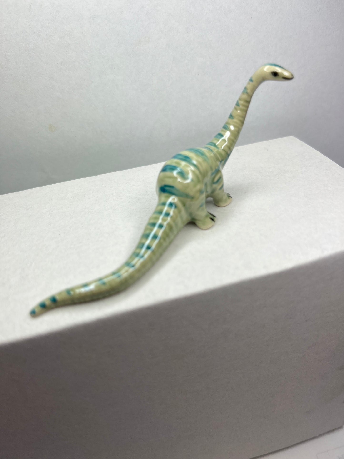 Miniature Porcelain Diplodocus Dinosaur Figurine