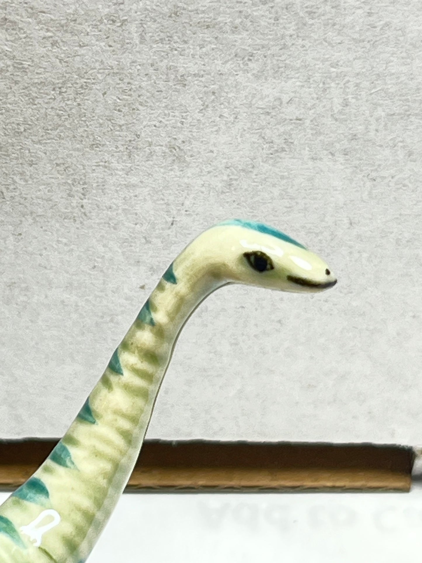 Miniature Porcelain Diplodocus Dinosaur Figurine