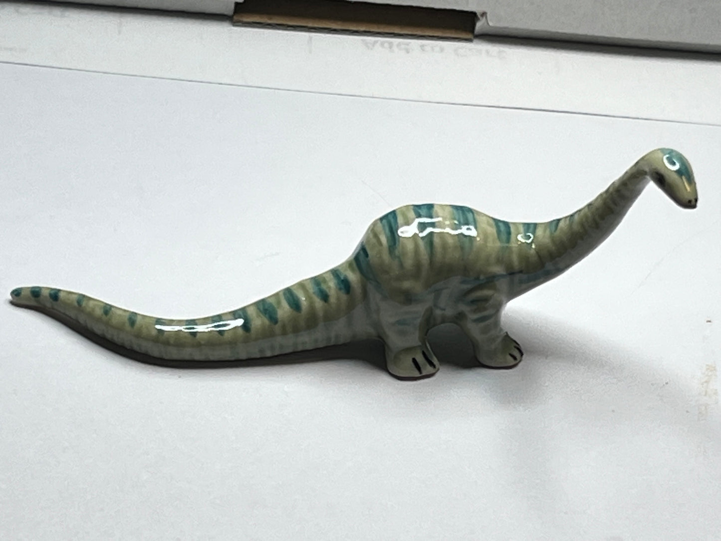 Miniature Porcelain Diplodocus Dinosaur Figurine