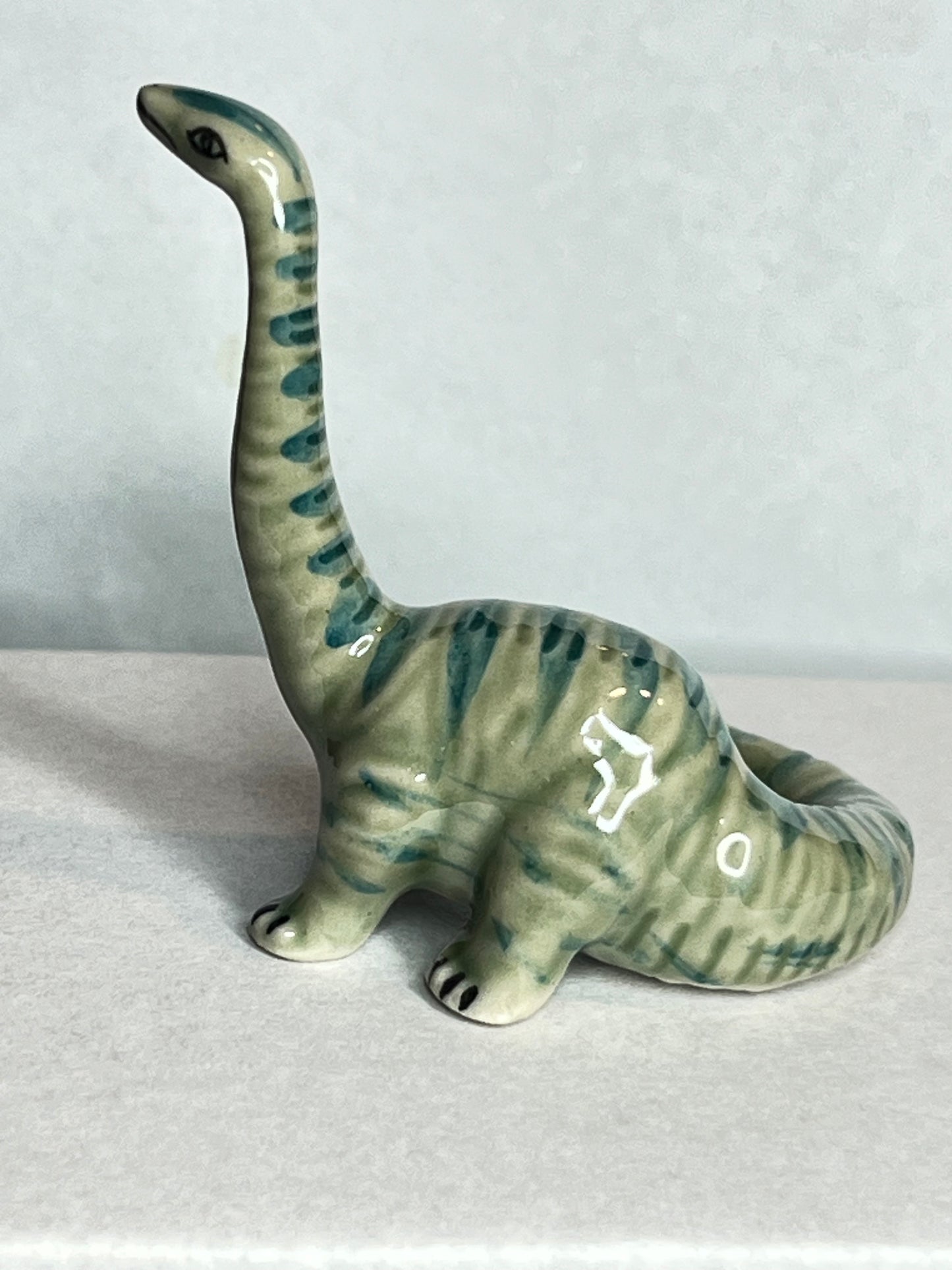 Miniature Porcelain Hand Painted Figurine Diplodocus Dinosaur - Looking Up Pose