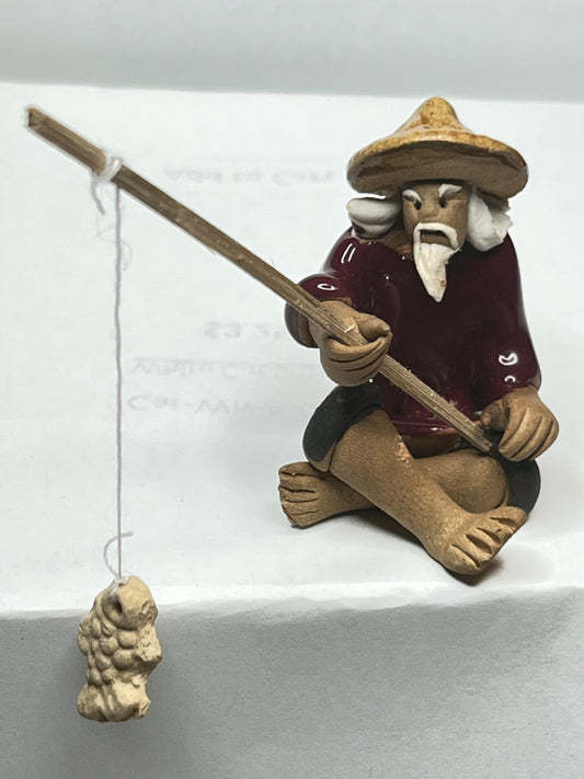 Miniature Handcrafted Fishing Man with Hanging Fish Figurine