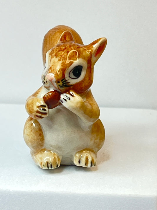 Miniature Porcelain Squirrel Eating Pine Cone Nut Figurine