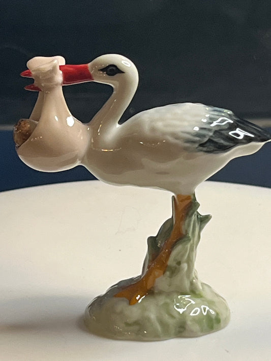 Miniature Hand Painted Porcelain Stork With Baby Girl