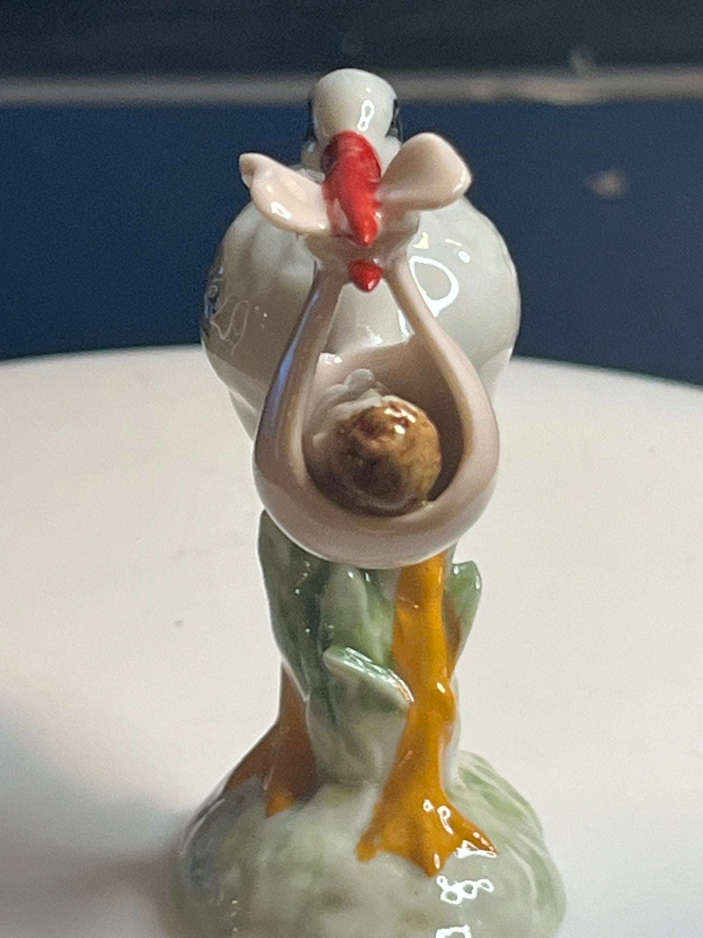 Miniature Hand Painted Porcelain Stork With Baby Girl