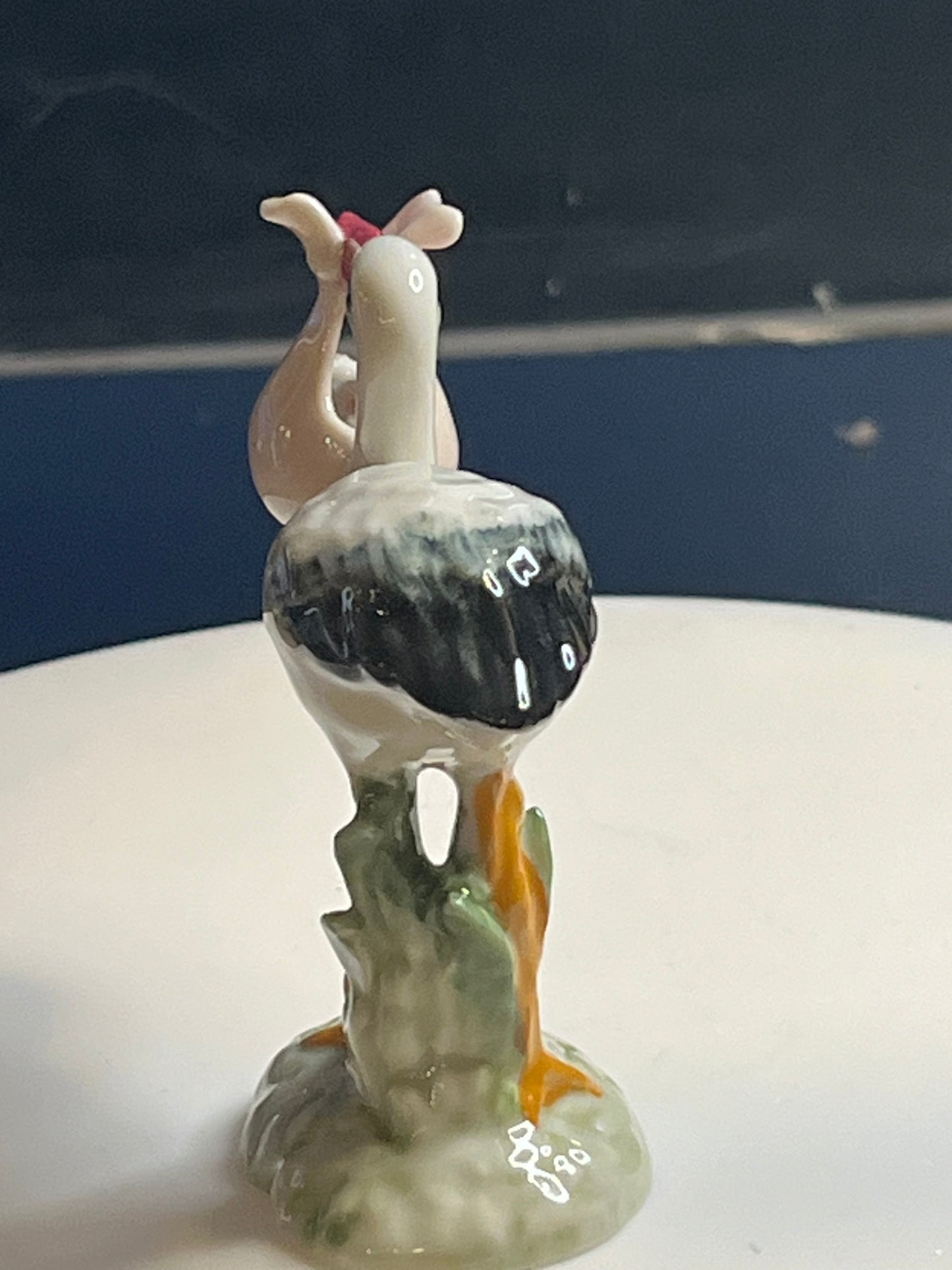 Miniature Hand Painted Porcelain Stork With Baby Girl
