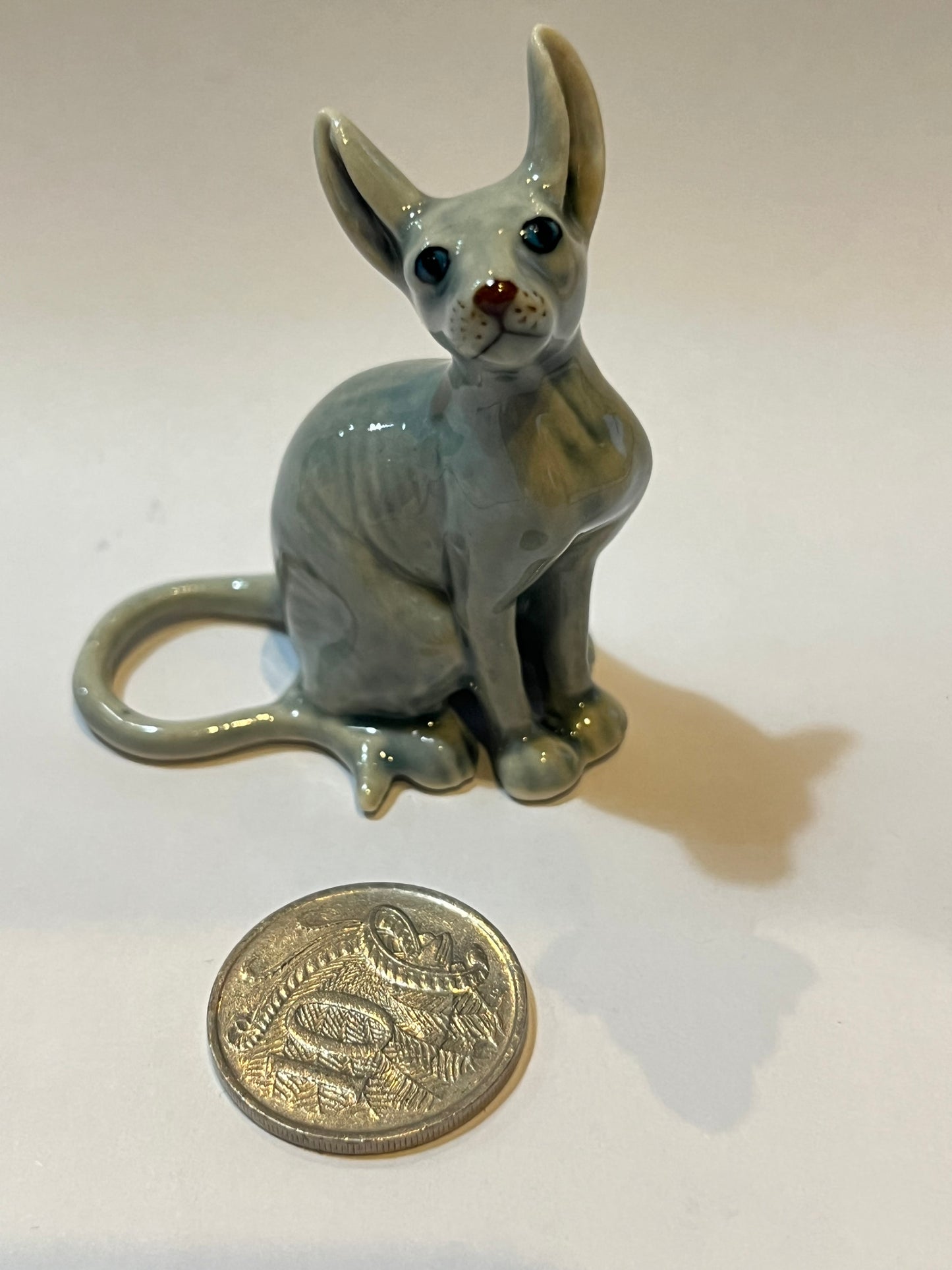 Miniature Porcelain Grey Sphynx Cat