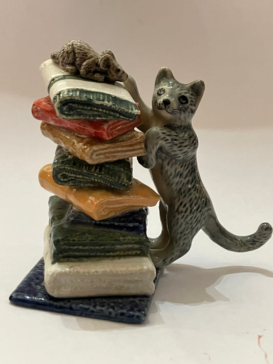 Miniature Porcelain Grey Cat Chasing Mouse On Towels
