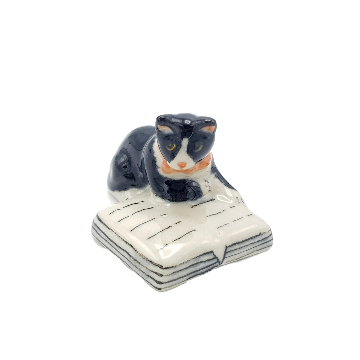Miniature Porcelain Black and White Cat Reading a Book Figurine