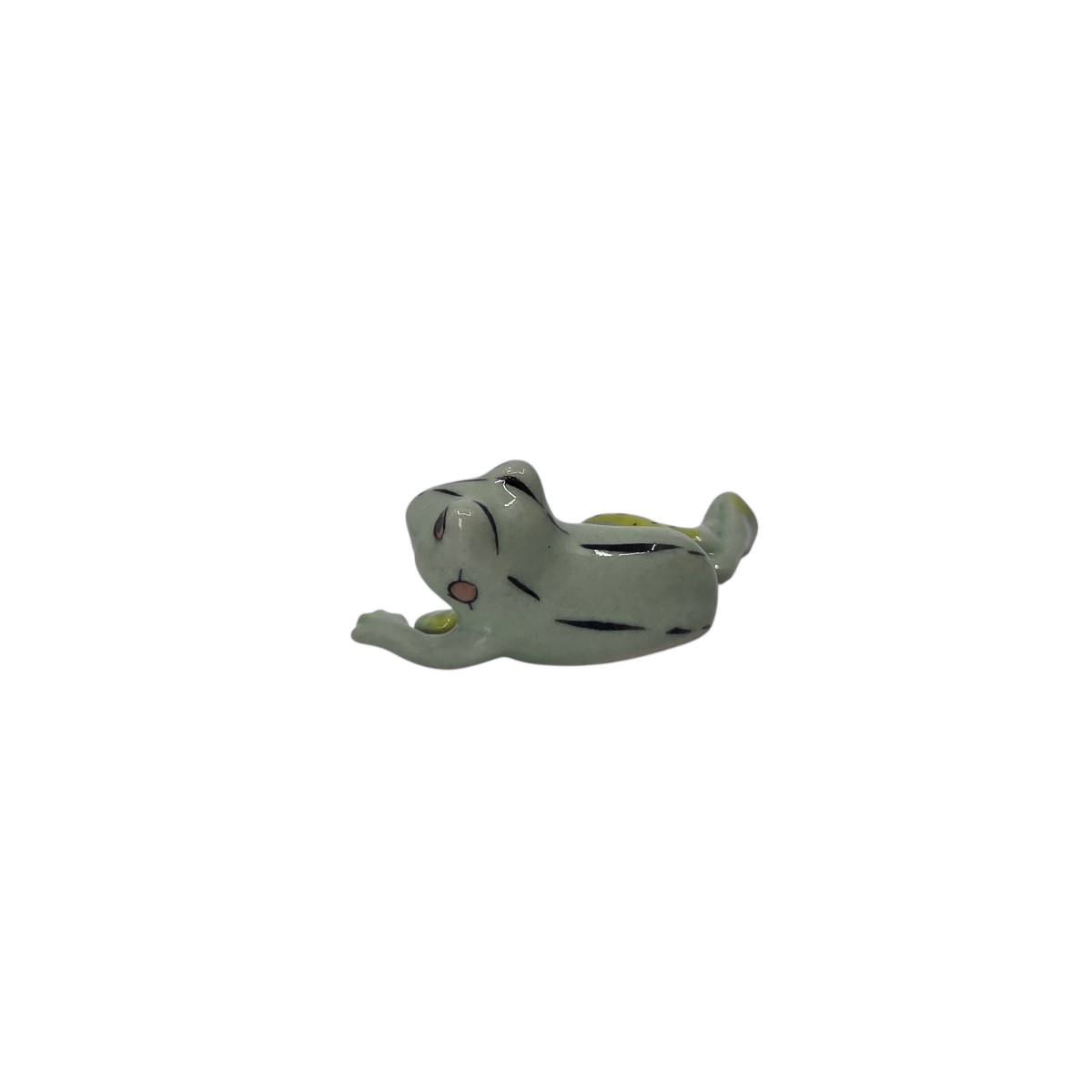 Miniature Frog Figurine Lying on its side